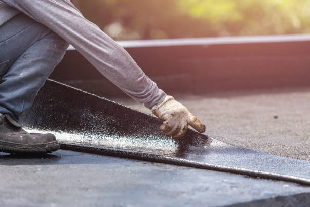 Professional Basement Waterproofing technician working in Henrietta, NY